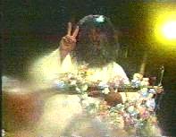 The Maharishi gets hit with the flowers again.