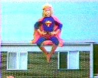 Superhippy sitting on a building.